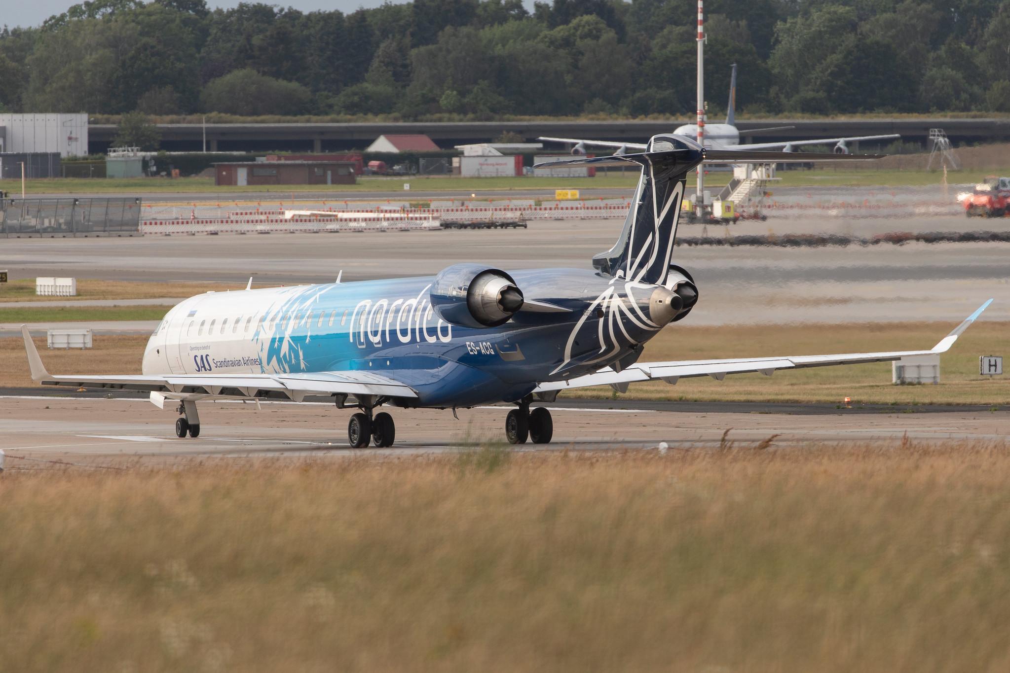 Hamburg Airport: Nordica (EE / EST) | Operator: LOT |  Mitsubishi CRJ-900LR CRJ9 | ES-ACG | MSN 15277